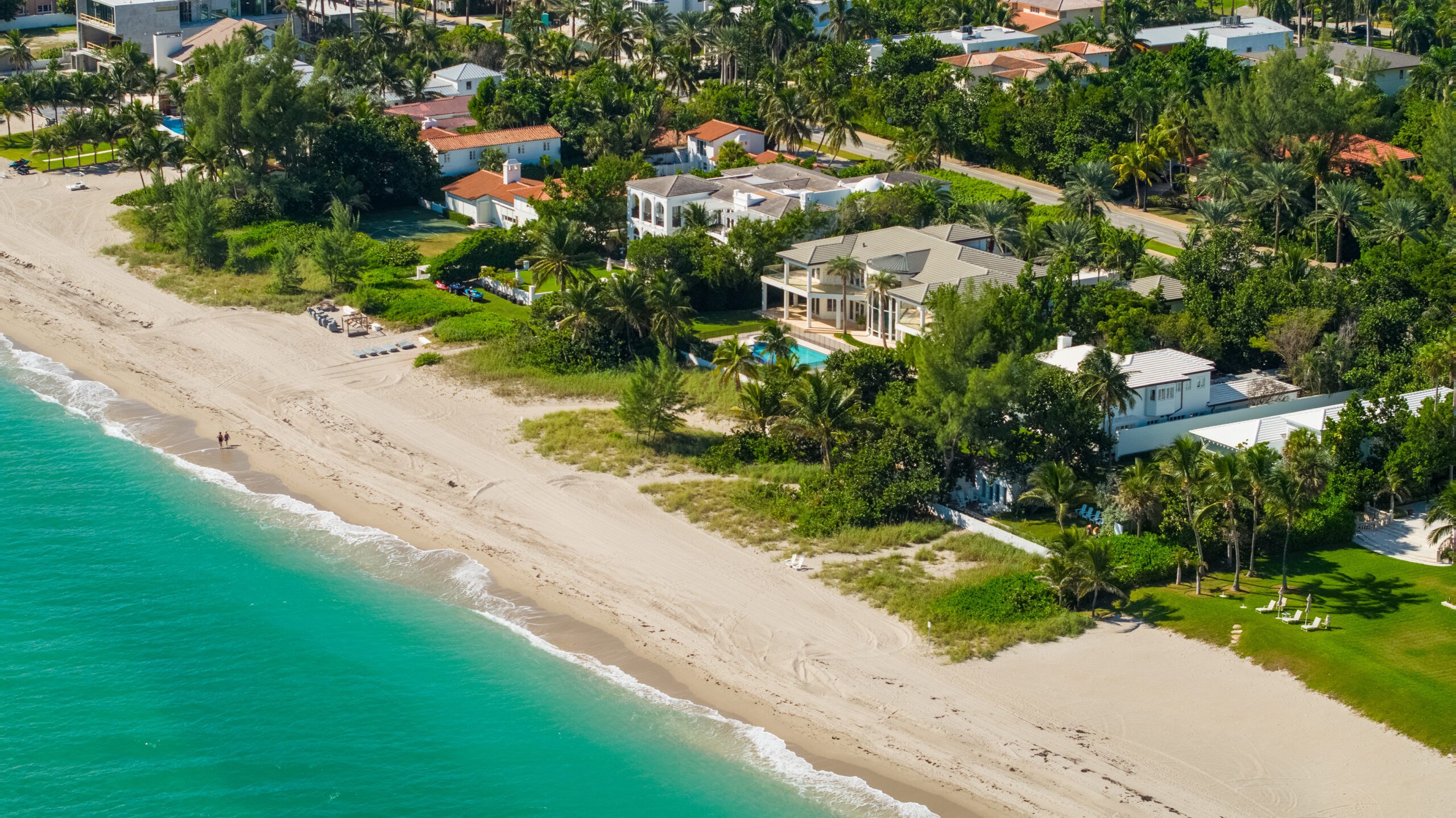 aerial image of luxury homes in a beachfront neighborhood